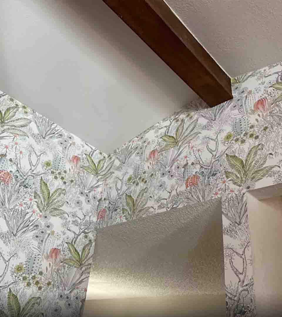 Close-up of wallpaper installation showing precise seam alignment, Denver, Colorado