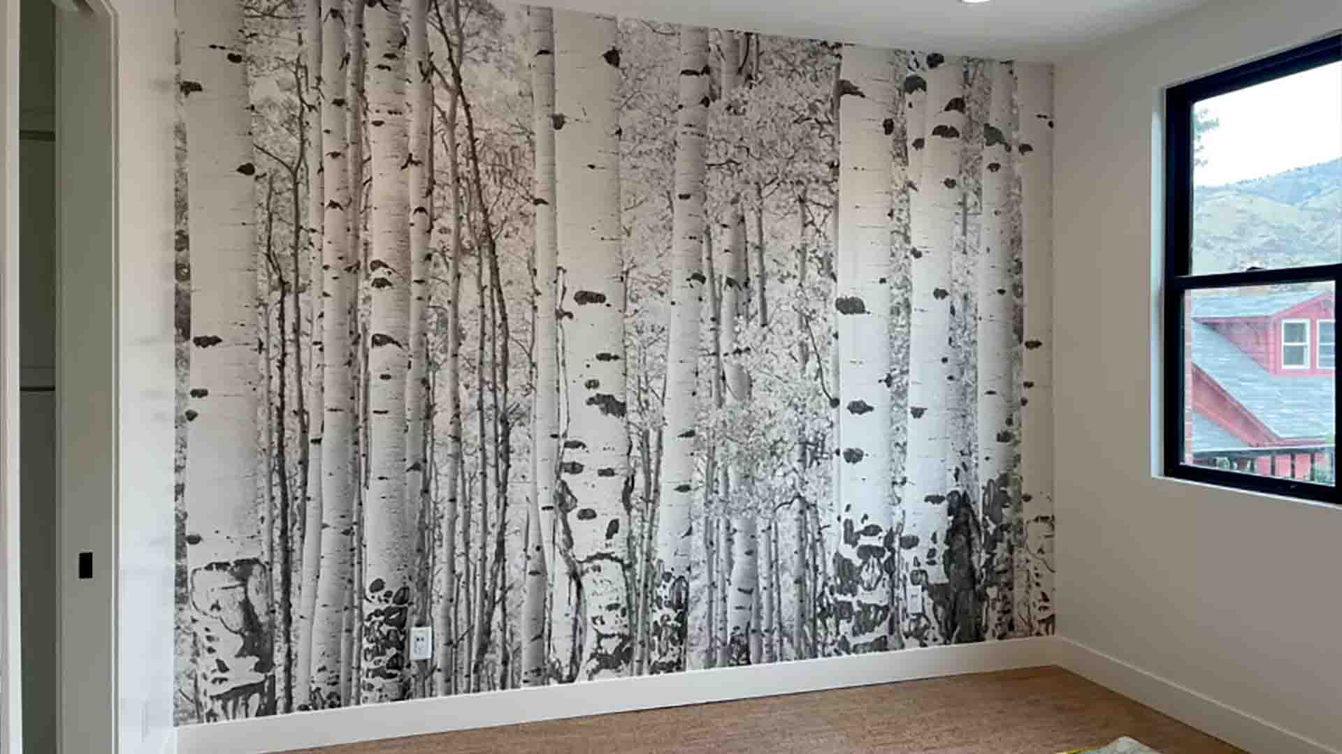 Non-woven wallpaper accent wall behind the bed in a bedroom, Lone Tree, Colorado
